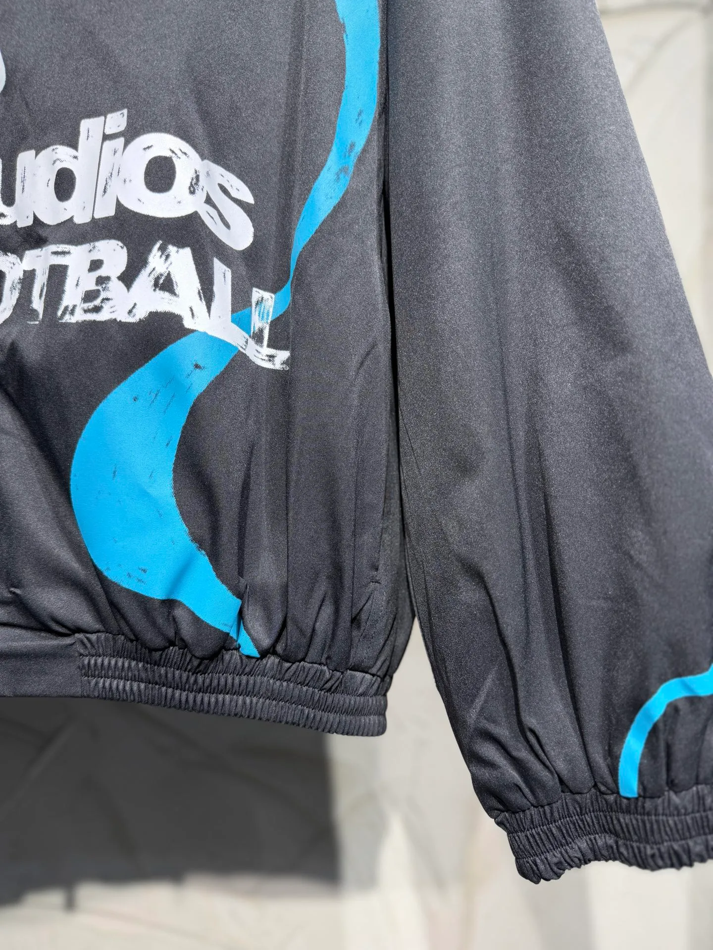 Acne studios World Cup Fashion Football Series Capsule Jacket Printed Jacket A capsule Series full of fun. Doodles, sketches and handwriting are all transformed into intentional designs. Imperfect lines and intuitive brushstrokes create a sense of reality, like a signed jersey or a message in the locker room. Each item carries a story, a memory, and a signature. Size: SML Color: Black, White